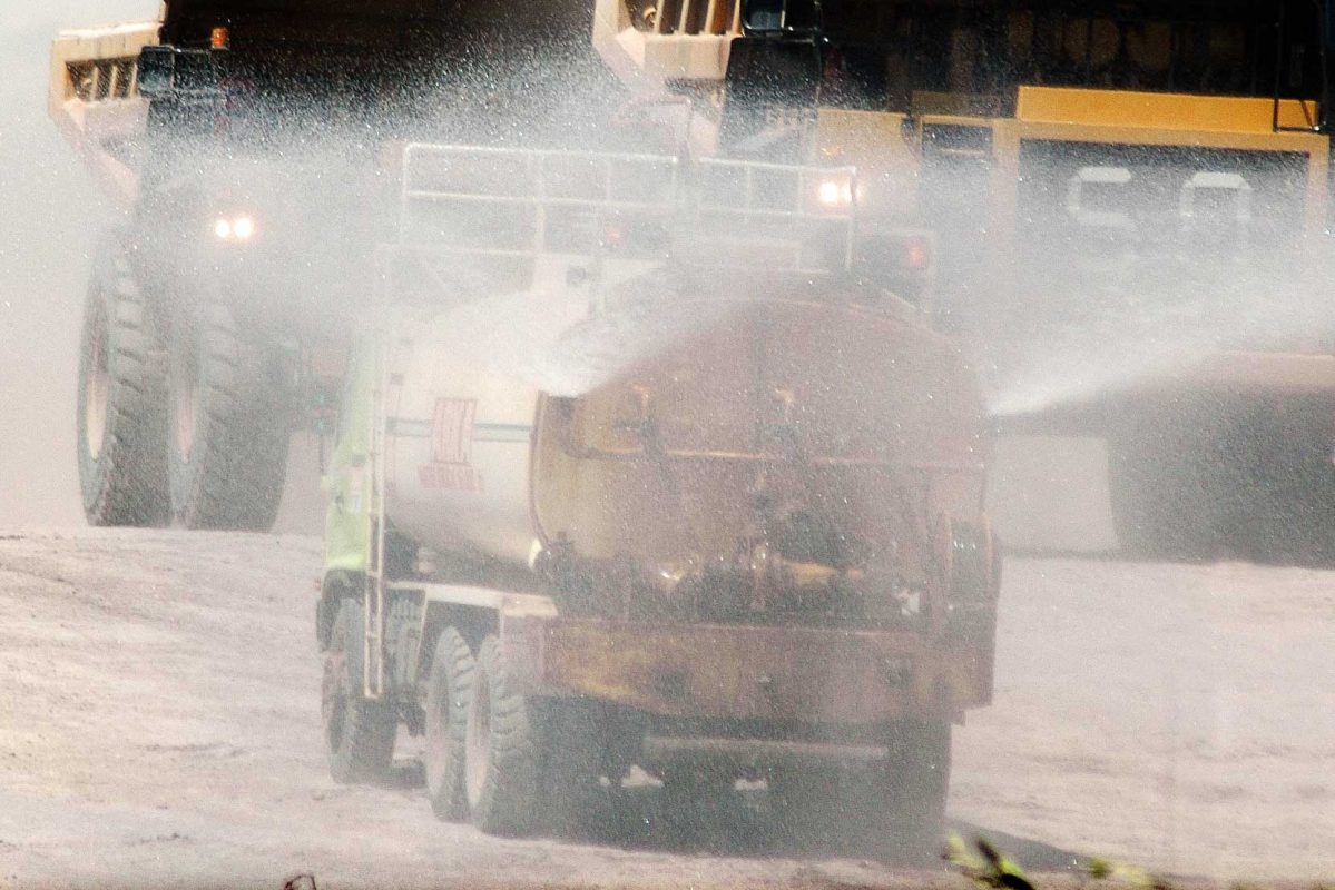 water truck spraying roads