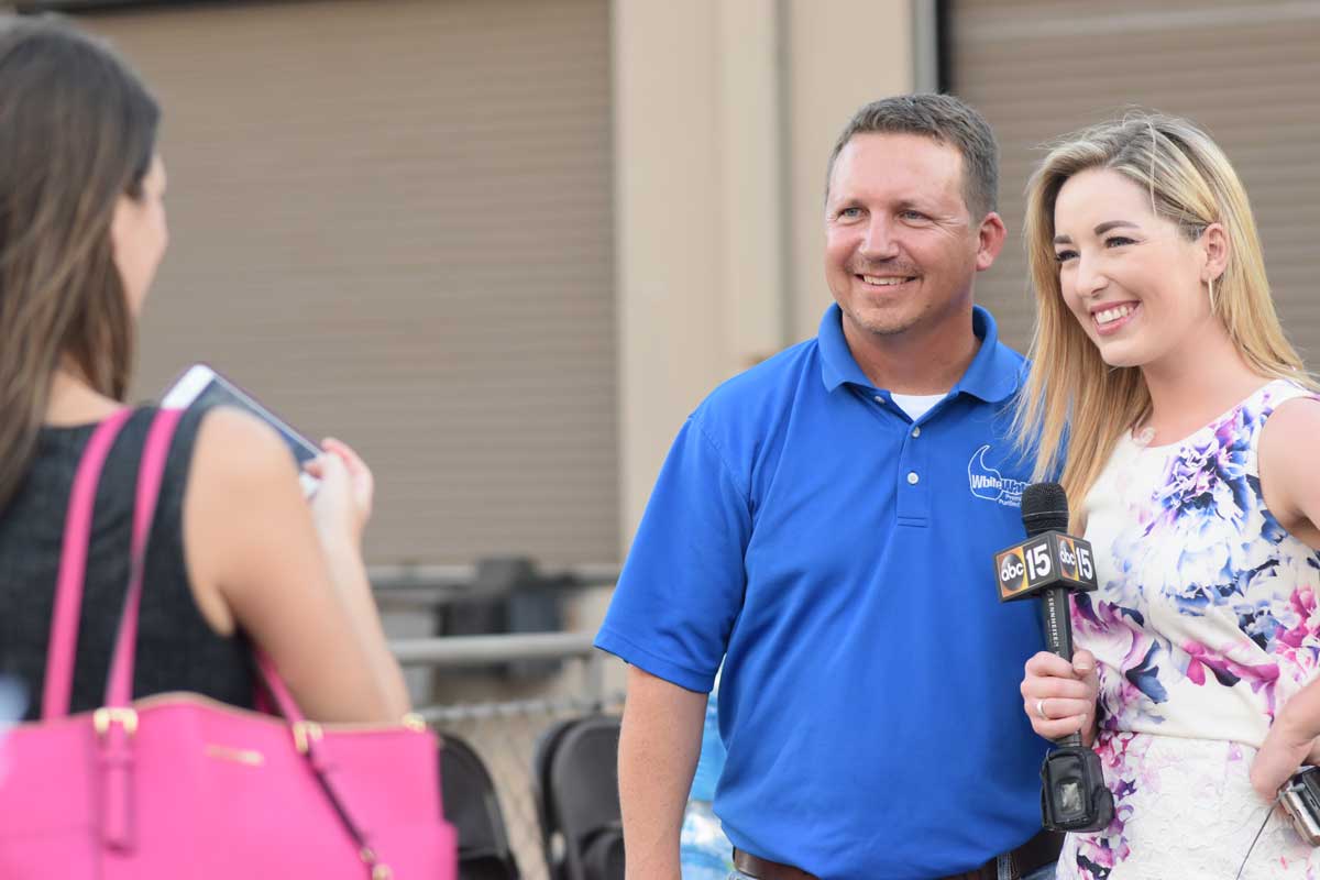 chris white with abc15 reporter for water drive