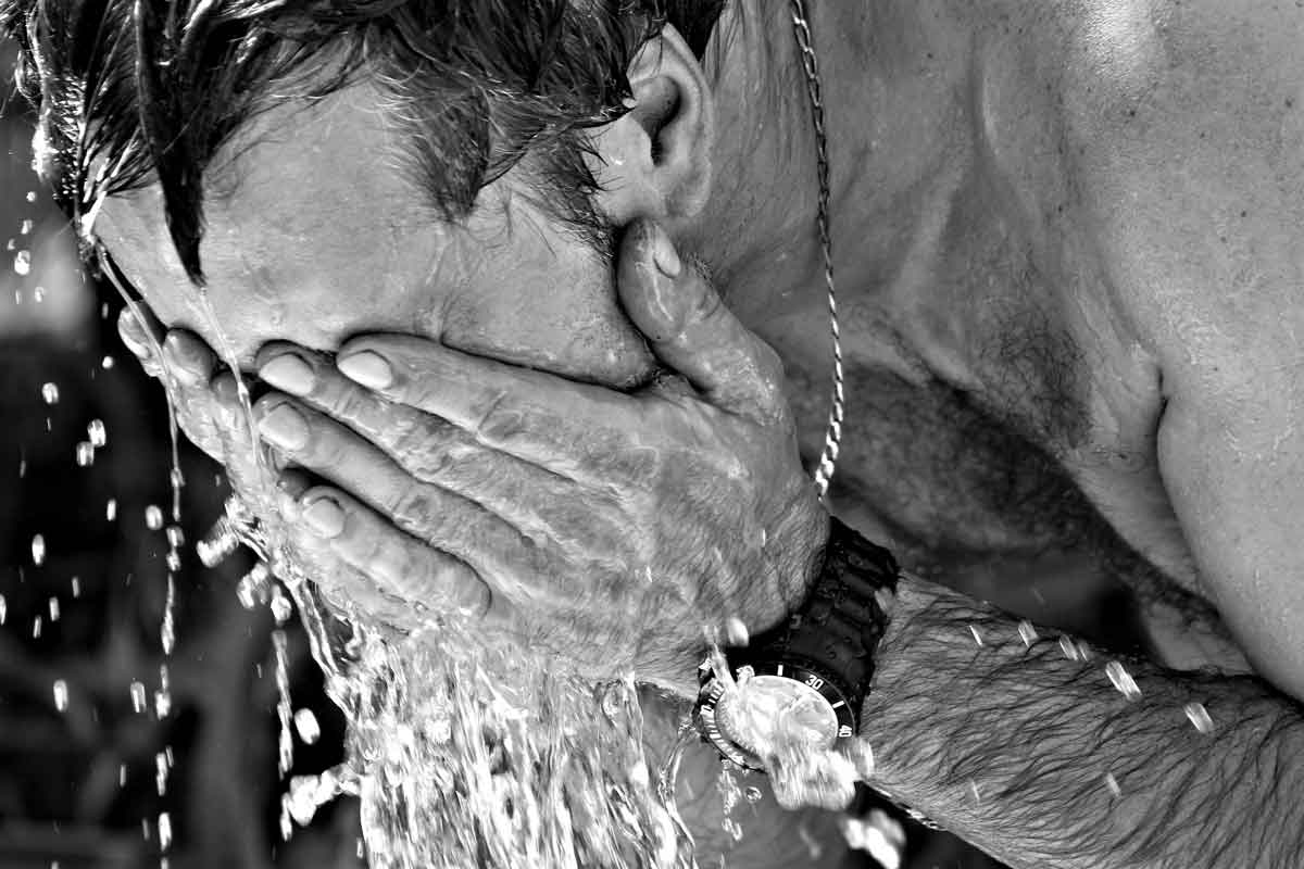 splashing water on face during Phoenix heat