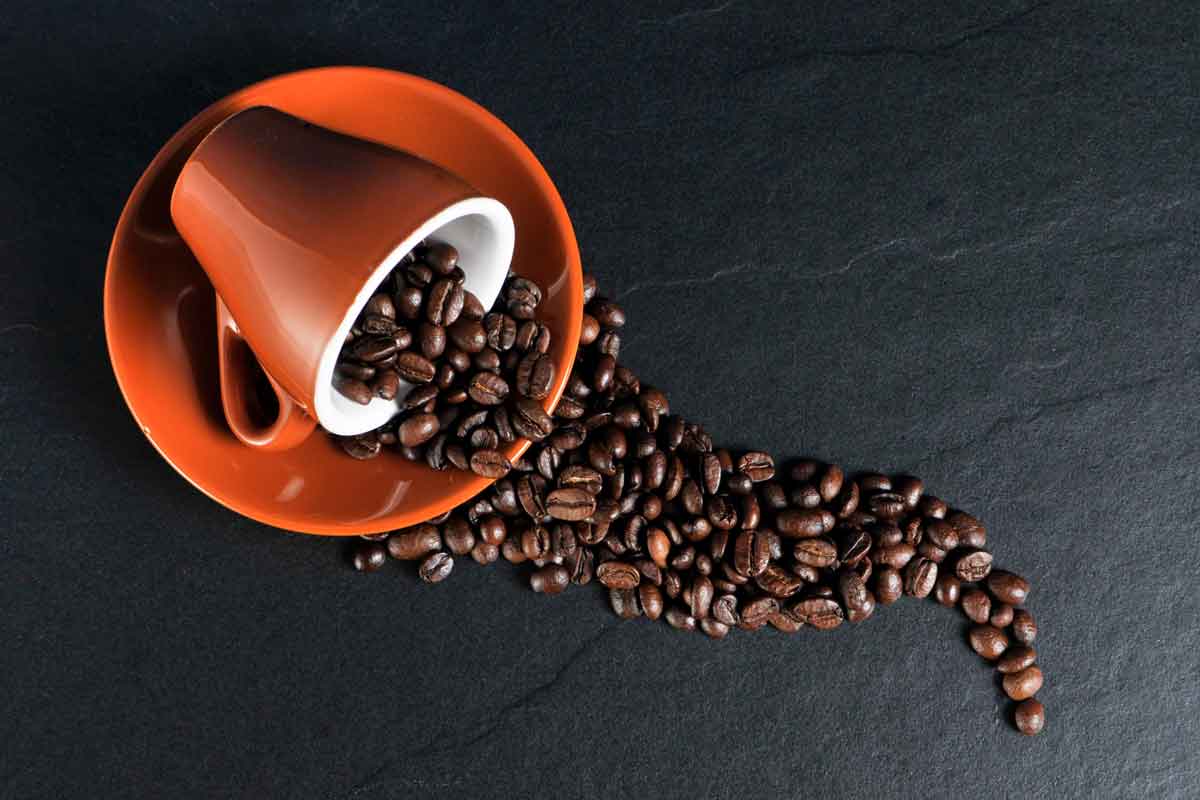 coffee beans spilled on desk