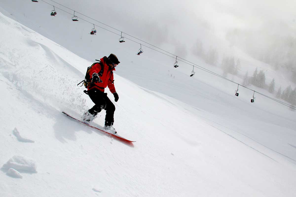snowboarding down the mountain