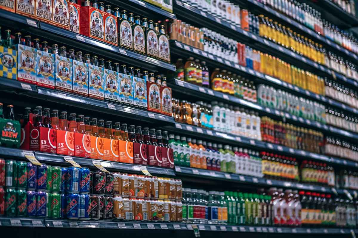 soda and sugary beverages in grocery aisle